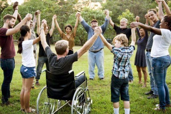 Group-of-people-holding-hand-together-in-the-park-1024x569